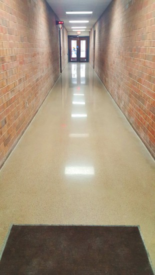 The hallway of the Waukesha County Technical College is fully restored thanks to PSP's RENEW WS, a single component, self-leveling overlayment.